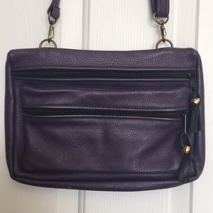 Nericcio purple leather purse